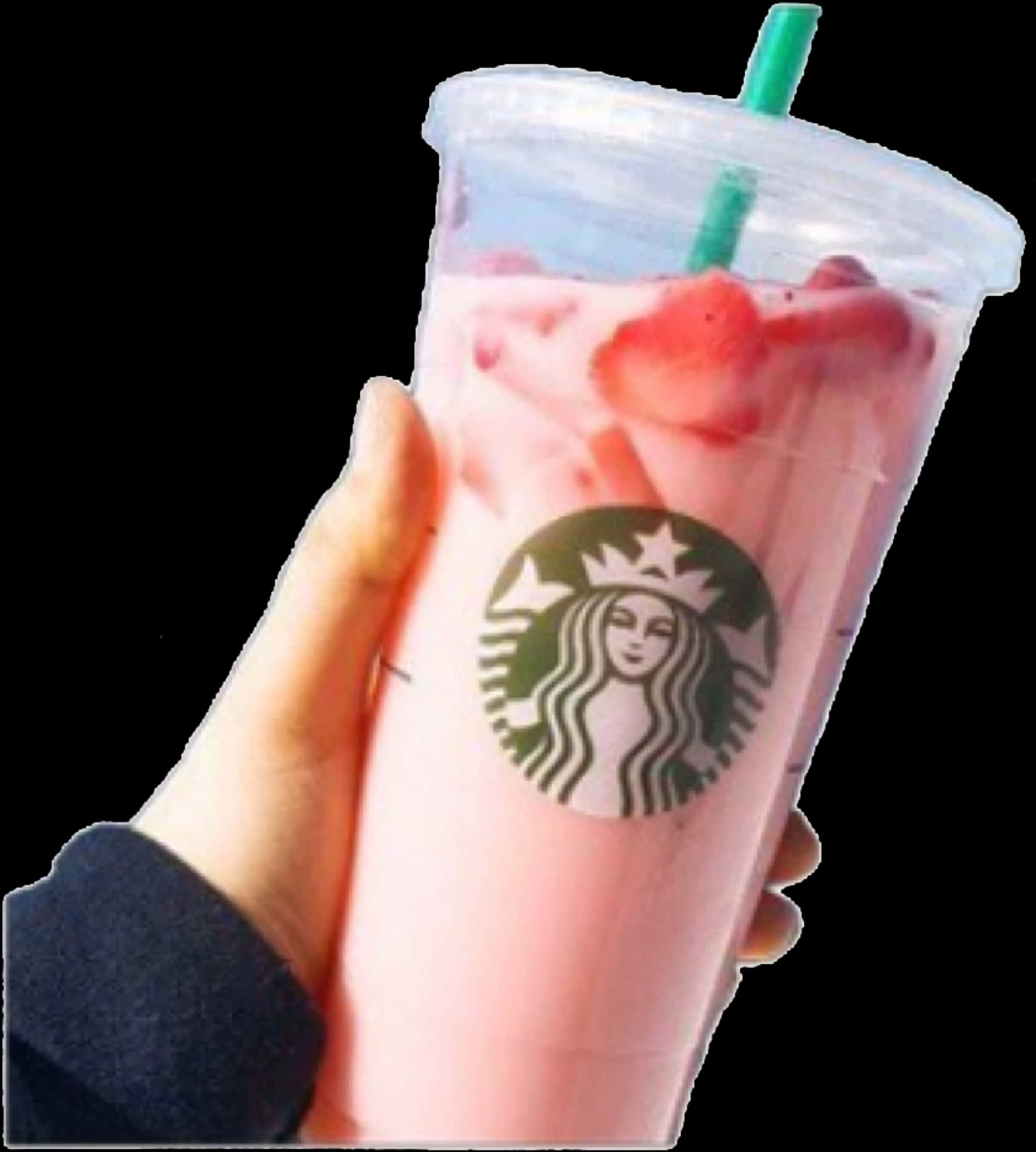 Starbucks Cup 桌布 壁紙 — 一隻手拿著一杯粉紅色的星巴克冰凍飲品，上面有新鮮草莓和綠色吸管，背景為黑色。