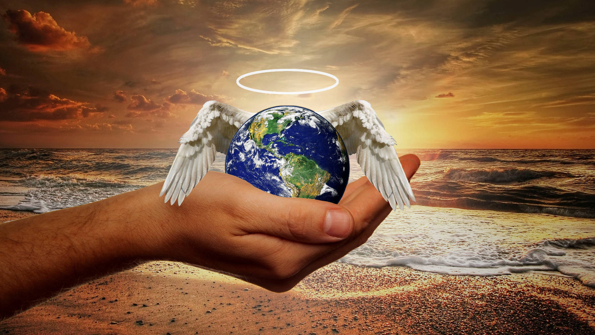 World 桌布 壁紙 — 一隻手捧著帶有天使翅膀和光環的地球，背景是日落海灘。