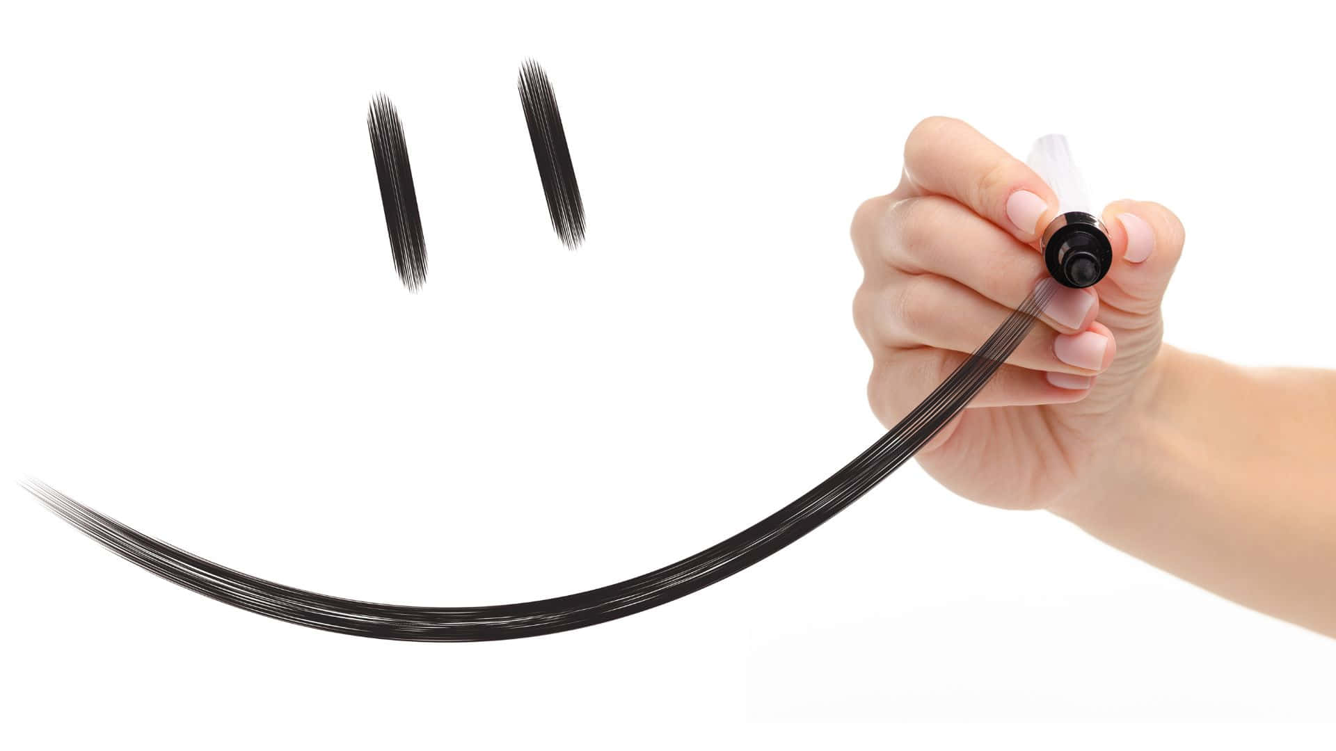 Smiley 桌布 壁紙 — 一隻手用馬克筆在純白背景上畫一個簡單的黑色笑臉。