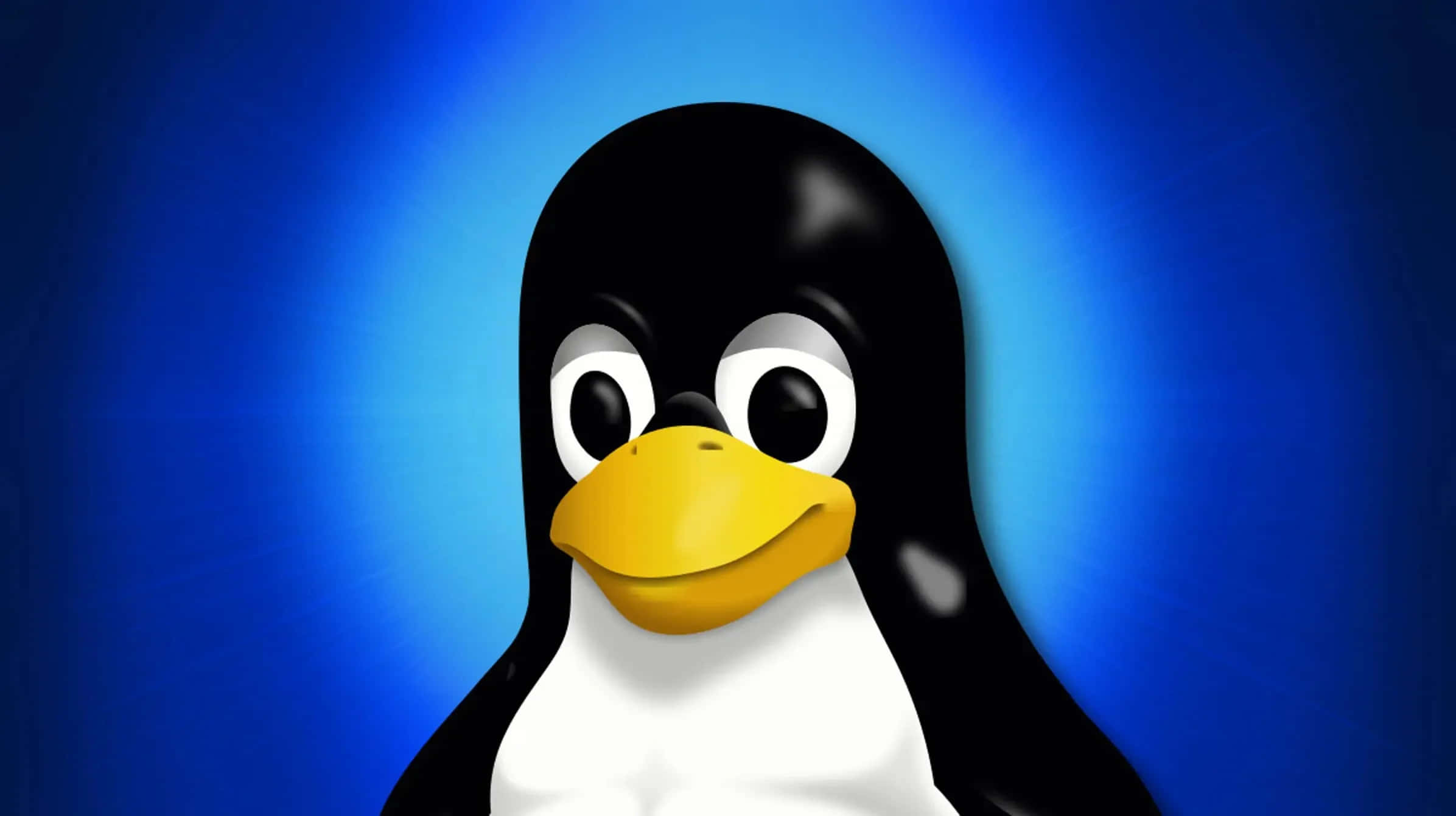 Linux 桌布 壁紙 — 一隻有光澤的卡通企鵝，黃色喙和大眼睛，站在發光的藍色漸變背景前。