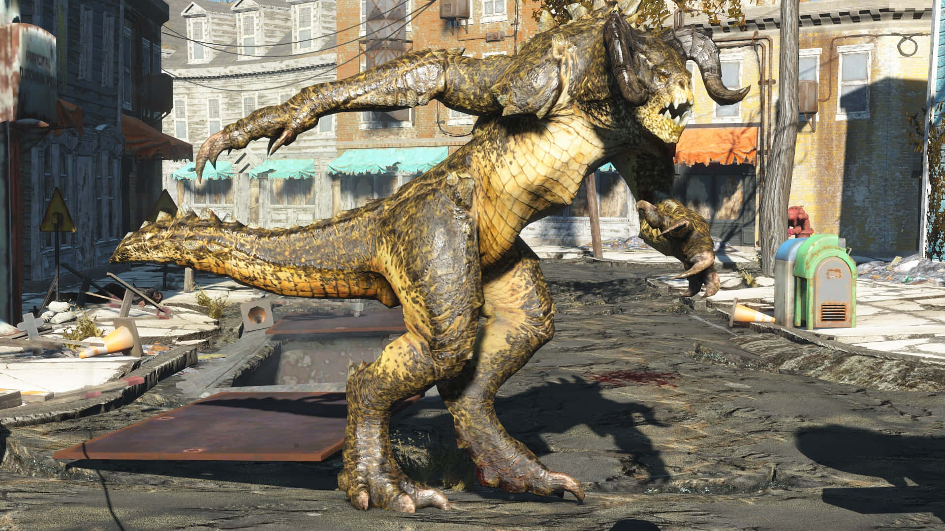 Deathclaw 桌布 壁紙 — 一隻有角和爪的怪獸爬蟲類生物在一條有破損建築和散落瓦礫的廢墟城市街道上徘徊。