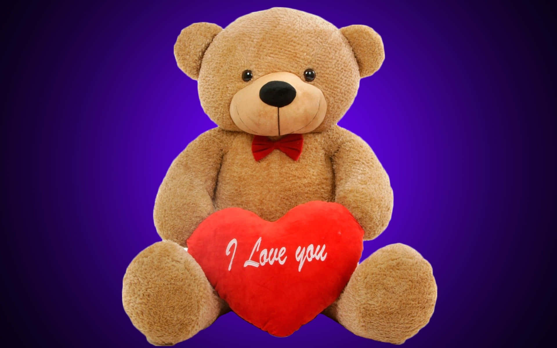 Teddy Bear 桌布 壁紙 — 一隻柔軟的棕色泰迪熊繫著紅色蝴蝶結，在深紫色漸變背景前抱著一個寫有 I Love you 的紅色心形枕頭。