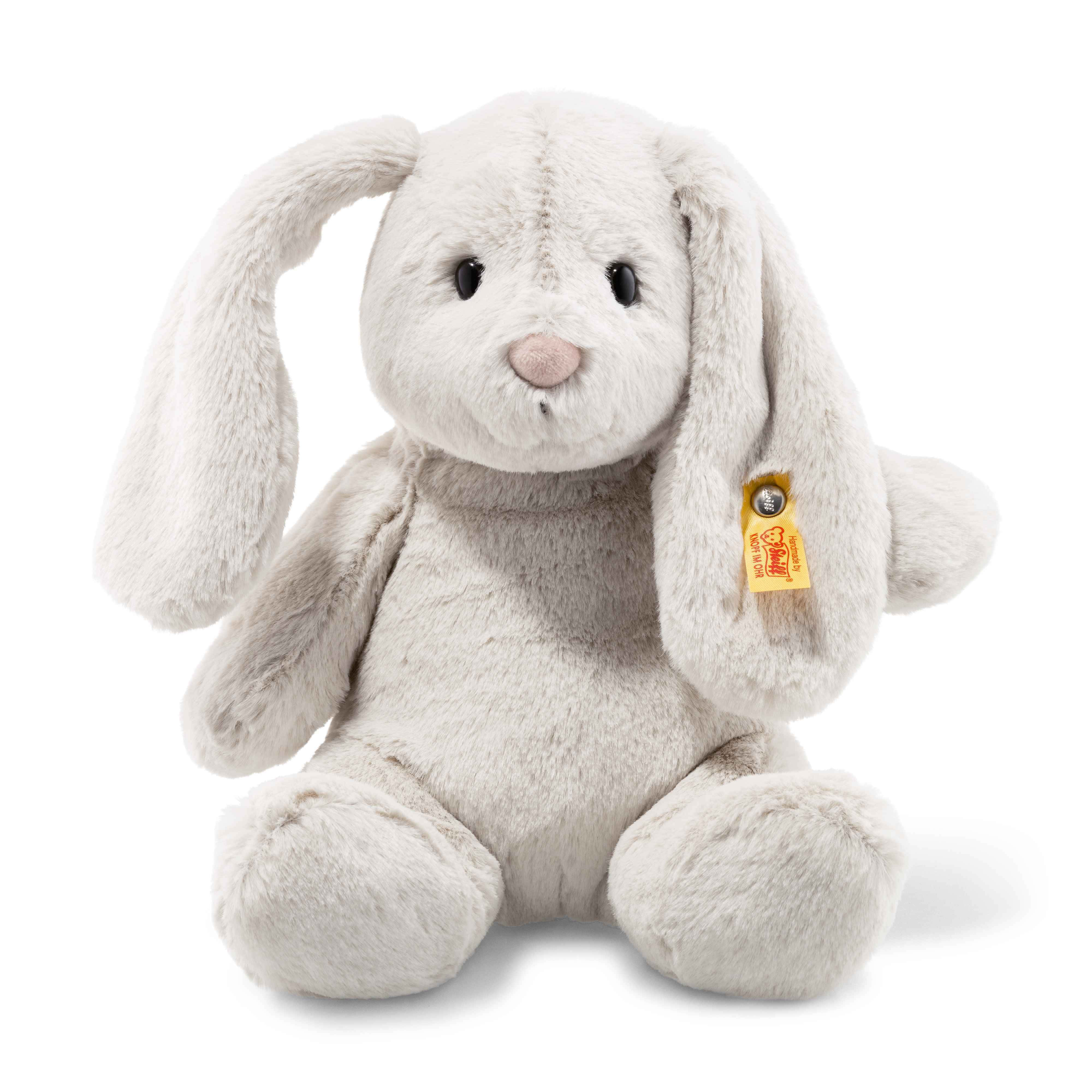 Cuddly 桌布 壁紙 — 一隻柔軟的灰色毛絨兔，長長的垂耳，直立在潔白的背景前。