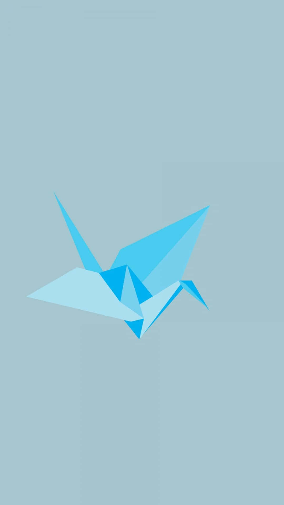origami 桌布 壁紙 — 一隻極簡藍色摺紙鶴漂浮在柔和的灰色背景上，帶有乾淨的幾何摺痕。