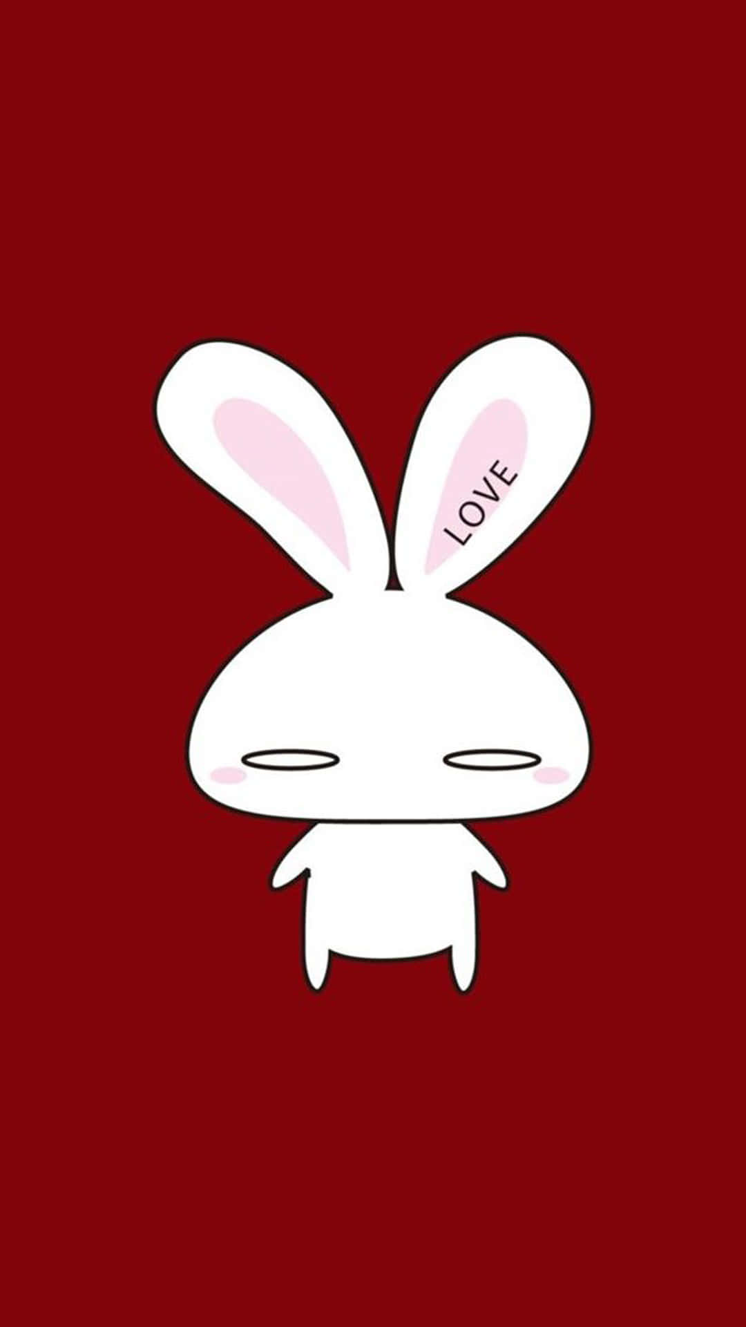 Cute Red 桌布 壁紙 — 一隻極簡風格的白色卡通兔，一隻耳朵上寫著LOVE，漂浮在純深紅色背景上。