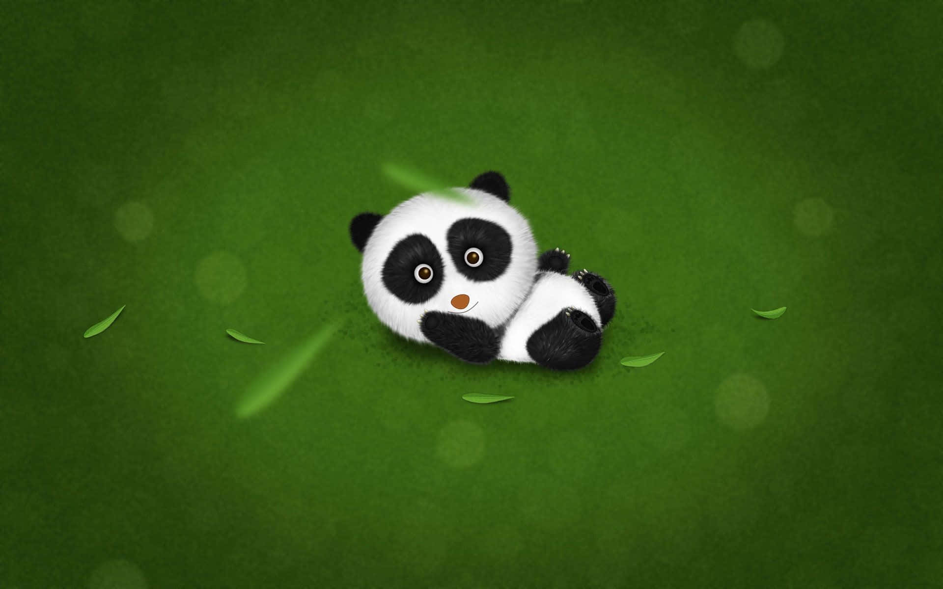 Girly Panda 桌布 壁紙 — 一隻毛茸茸的卡通熊貓寶寶蜷縮在充滿活力的綠色草地上，散落著樹葉和柔和的散景背景。