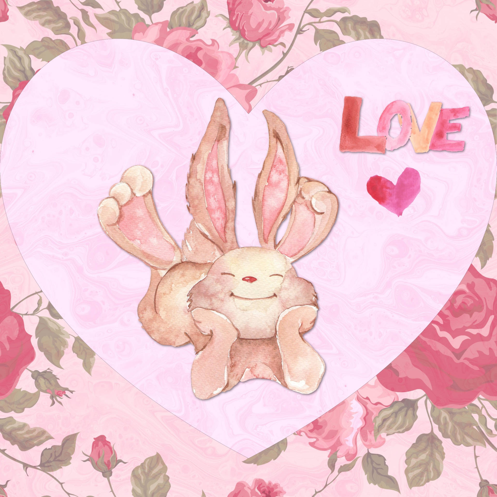 Valentines 桌布 壁紙 — 一隻水彩兔子閉著眼睛坐在粉紅色的心形內，周圍環繞著玫瑰和愛這個詞。
