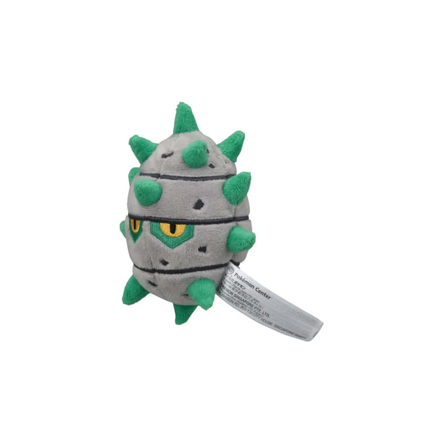 高清 桌布 壁紙 — 一隻灰色和綠色的寶可夢 Spiky eared Pokémon 毛絨玩具，有黃色眼睛和一個標籤。