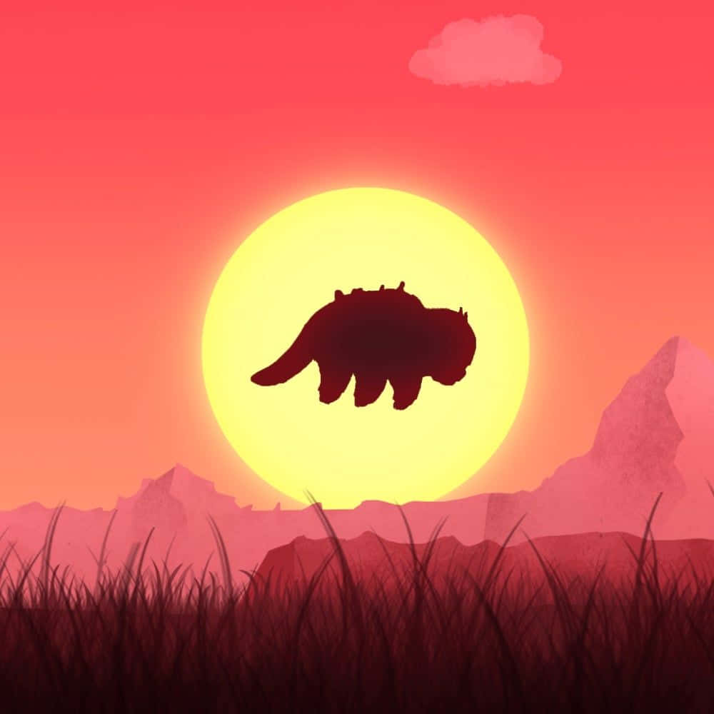 Appa Avatar 桌布 壁紙 — 一隻熊的剪影走過一個巨大的太陽，太陽正落在粉紅色的山脈和草地上。