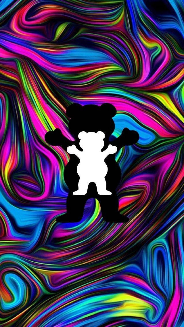 Trippy Dope 桌布 壁紙 — 一隻白熊剪影在充滿活力的抽象背景中，對著霓虹色彩的迷幻漩渦。
