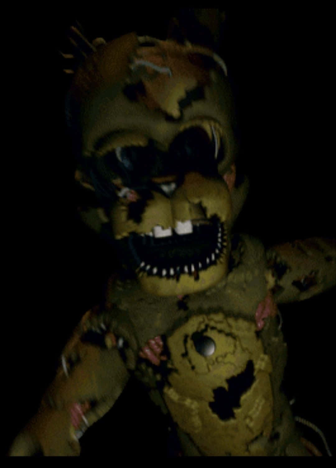 Scraptrap 桌布 壁紙 — 一隻破爛的黃色電子熊，擁有鋒利的牙齒和發光的眼睛，在黑暗中威脅地凝視。