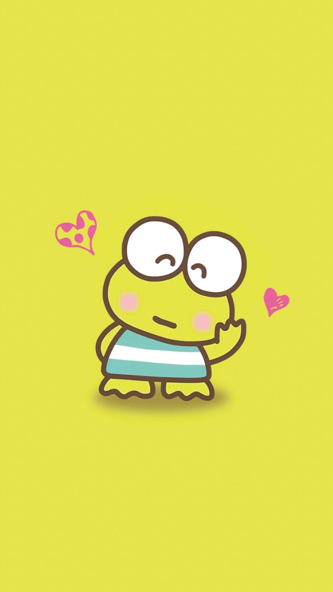 Keroppi 桌布 壁紙 — 一隻穿著條紋襯衫的可愛卡通青蛙在純黃色背景上揮手，周圍有漂浮的心形。