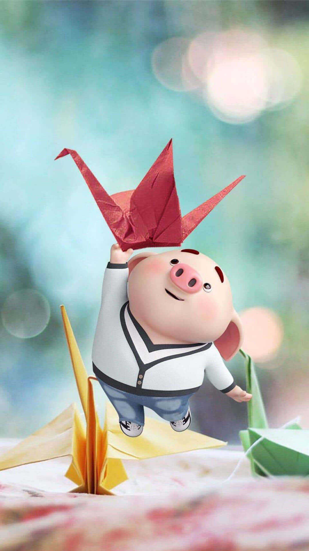 Piggy 桌布 壁紙 — 一隻穿著水手服的快樂卡通豬，在柔和的散景背景下，高興地拿著一隻紅色摺紙鶴。