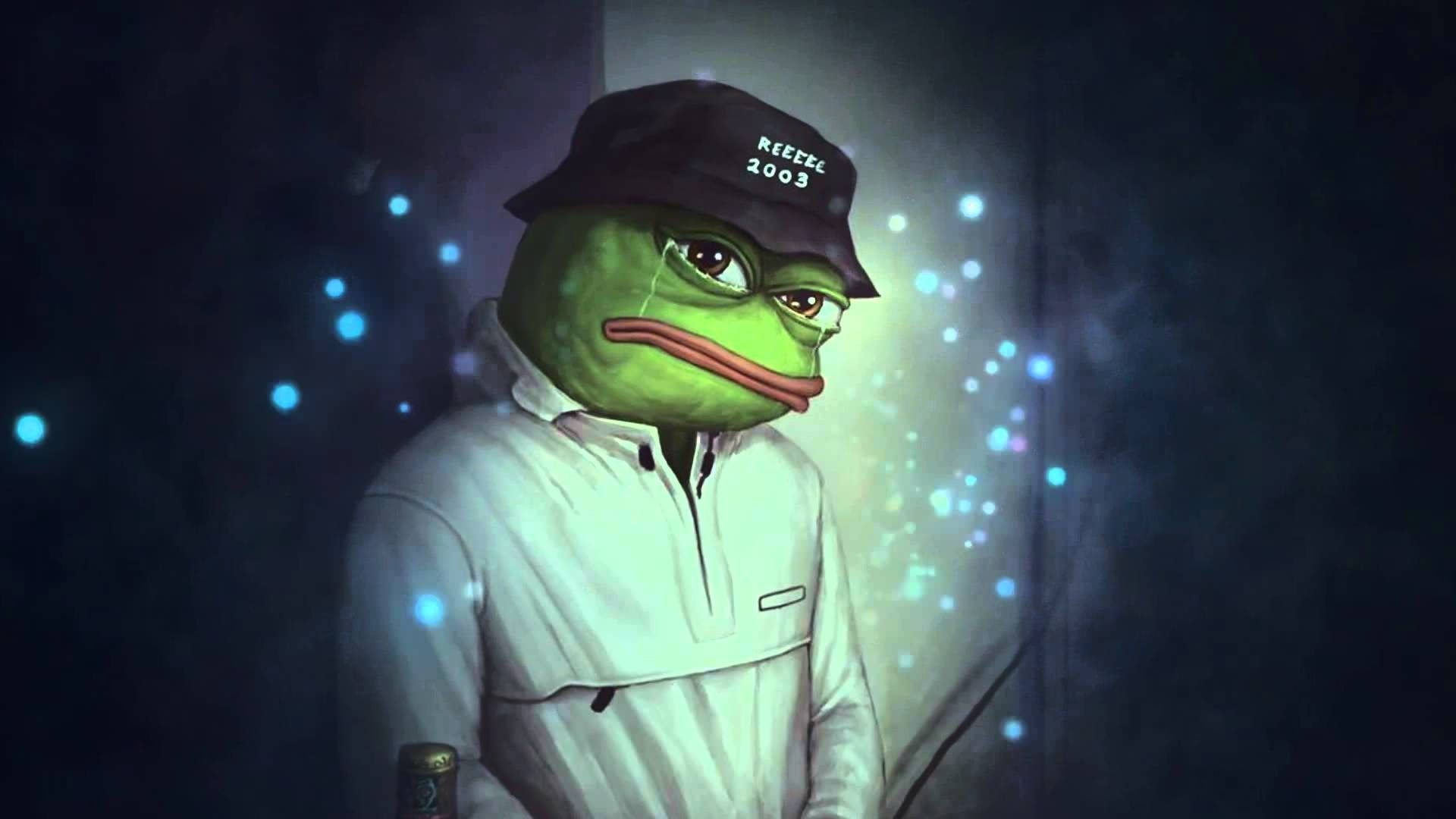 pepe frog 桌布 壁紙 — 一隻穿著白色外套和黑色帽子的憂鬱綠色青蛙，站在一個昏暗的房間裡，周圍漂浮著發光的藍色粒子。