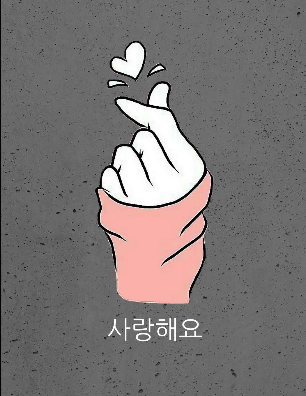 Kpop Aesthetic 桌布 壁紙 — 一隻穿著粉紅色袖子的風格化手，在斑點灰色背景前用手指做出心形手勢。