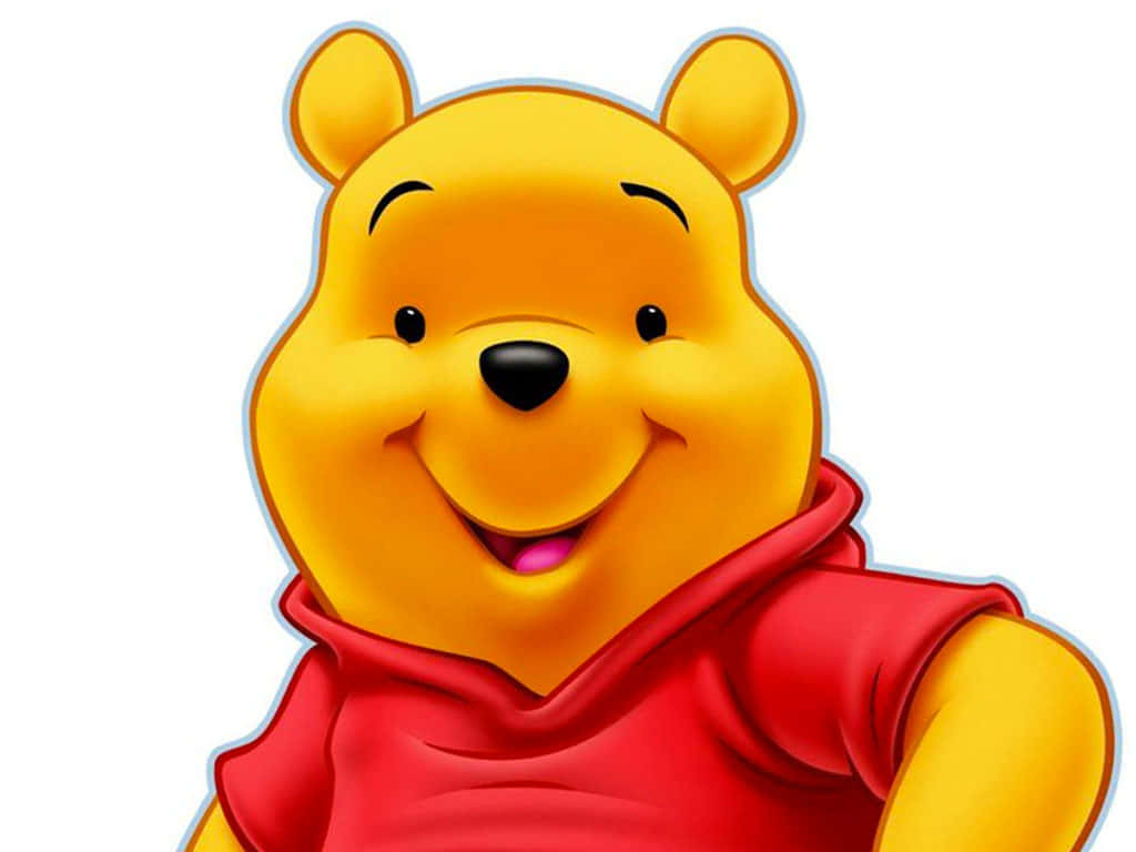 winnie the pooh 桌布 壁紙 — 一隻穿著紅色襯衫的快樂黃色卡通熊在純白色背景上燦爛地微笑。