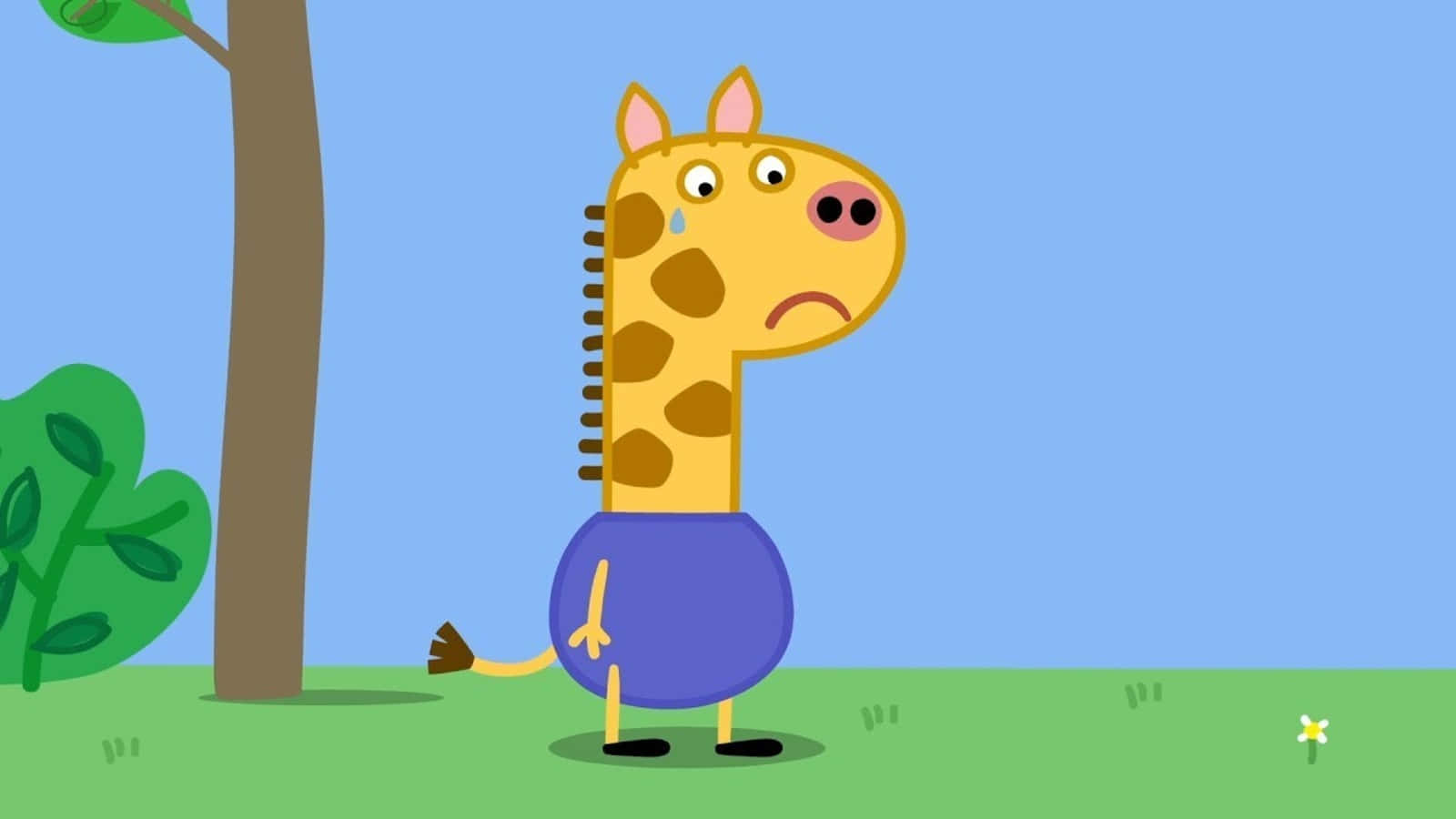 Gerald Giraffe 桌布 壁紙 — 一隻穿著紫色襯衫的卡通長頸鹿悲傷地站在樹下，臉頰上掛著一滴眼淚。