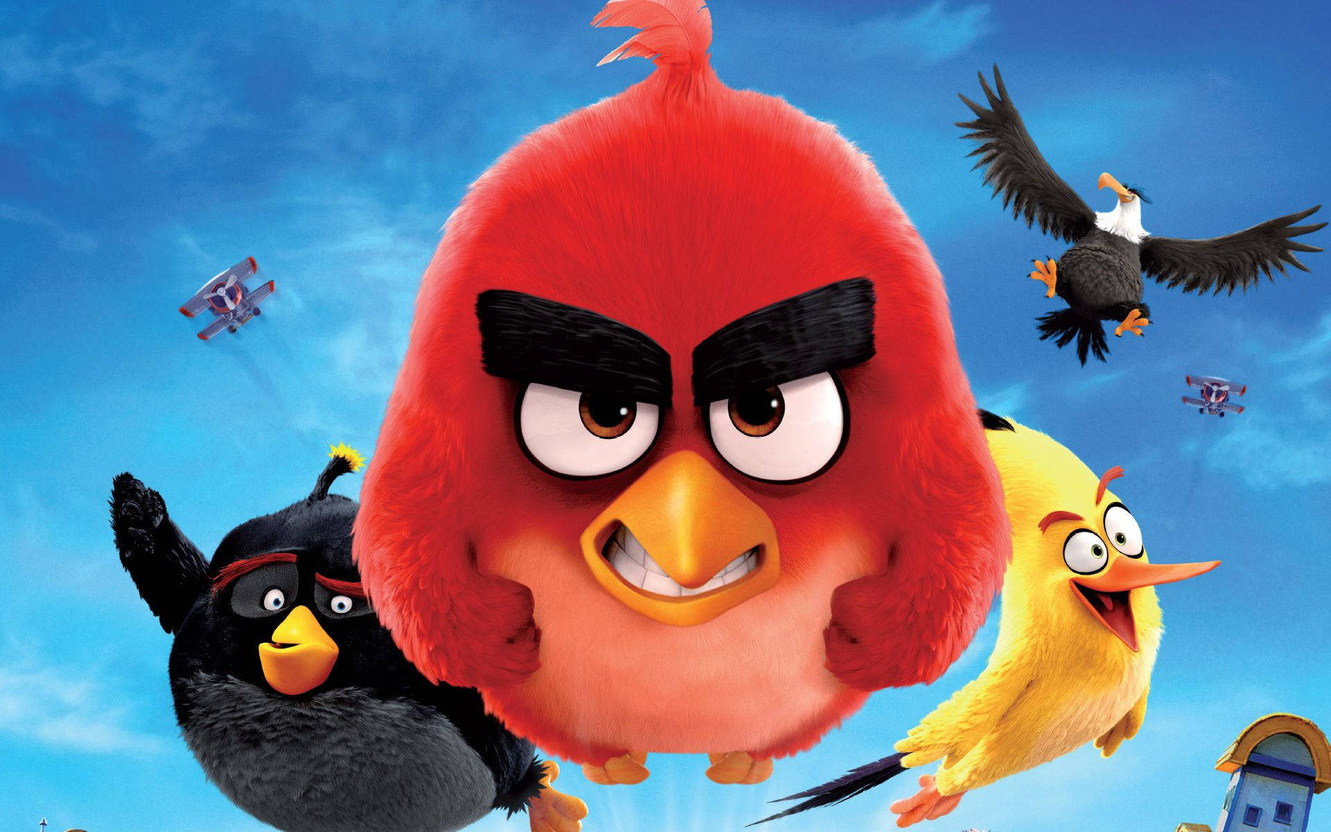 Angry Birds 桌布 壁紙 — 一隻紅色憤怒小鳥，黑色眉毛，怒視前方，一隻黃色小鳥在笑，一隻黑色小鳥在旁觀，背景是藍天，有飛機和一隻老鷹。