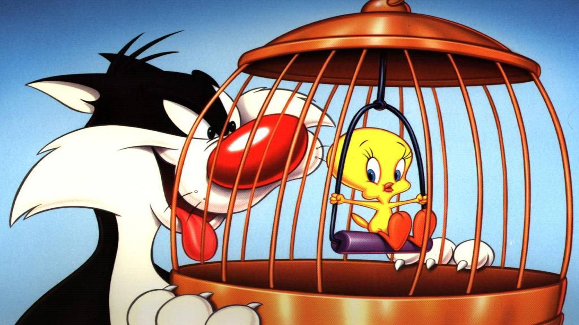 Sylvester 桌布 壁紙 — 一隻紅鼻子的卡通貓咪靠近一個鳥籠，裡面有一隻黃色小鳥坐在鞦韆上。