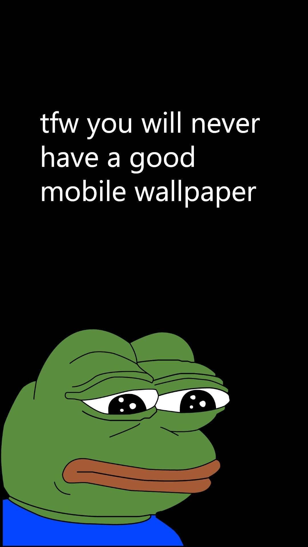 meme 桌布 壁紙 — 一隻綠色卡通青蛙，表情悲傷，上方有文字，背景為黑色。