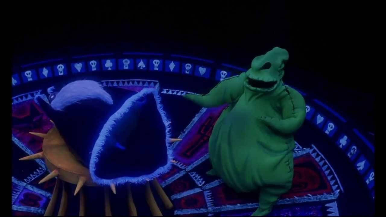 nightmare 桌布 壁紙 — 一隻綠色縫合怪物站在一個發光藍色嘴巴的生物旁邊，背景是帶有紙牌符號的深色圖案舞台。
