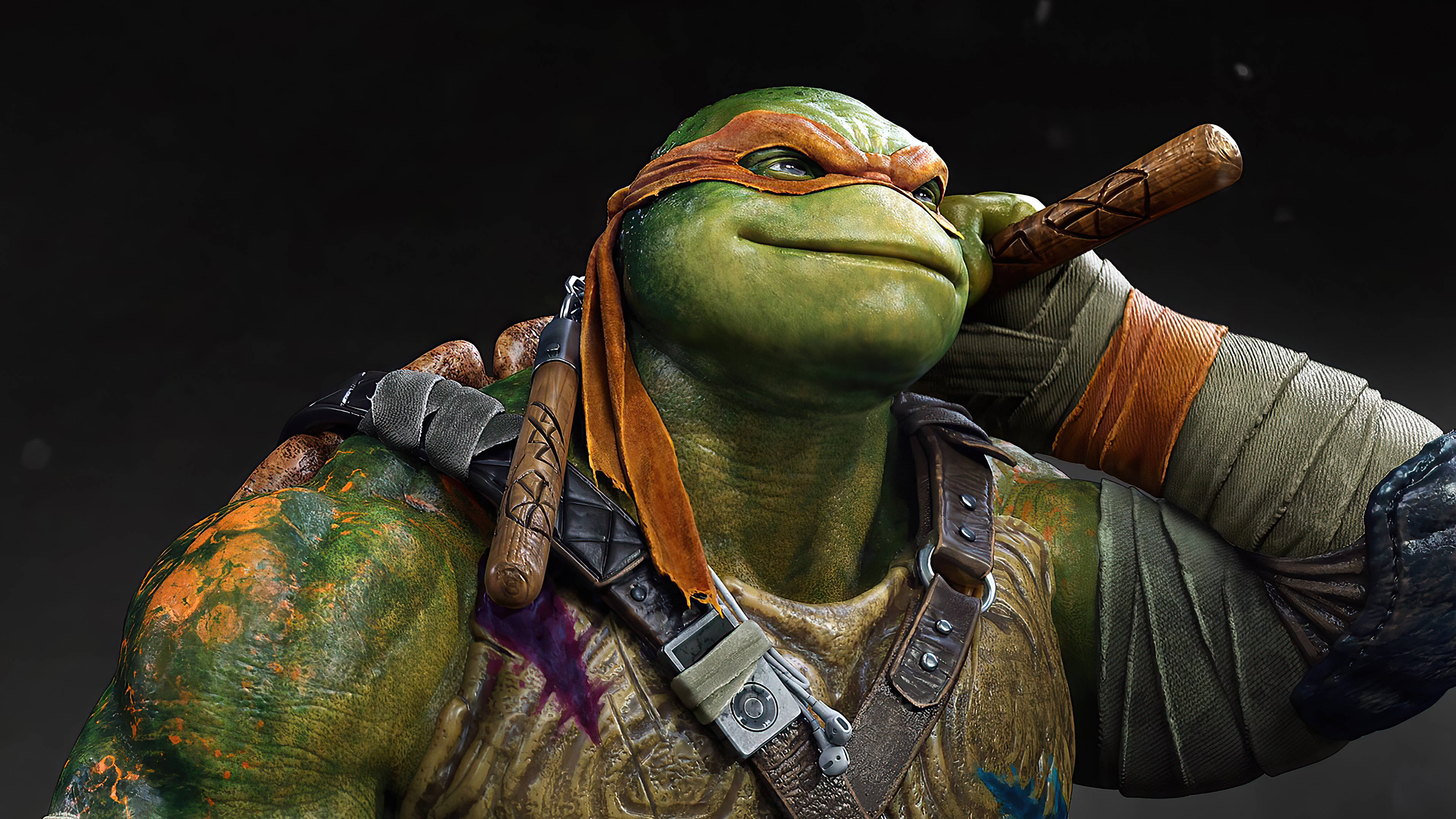 teenage mutant ninja turtles 桌布 壁紙 — 一隻肌肉發達的綠色烏龜，戴著橙色面具和繃帶手臂，在黑暗背景下握著一根木杖。