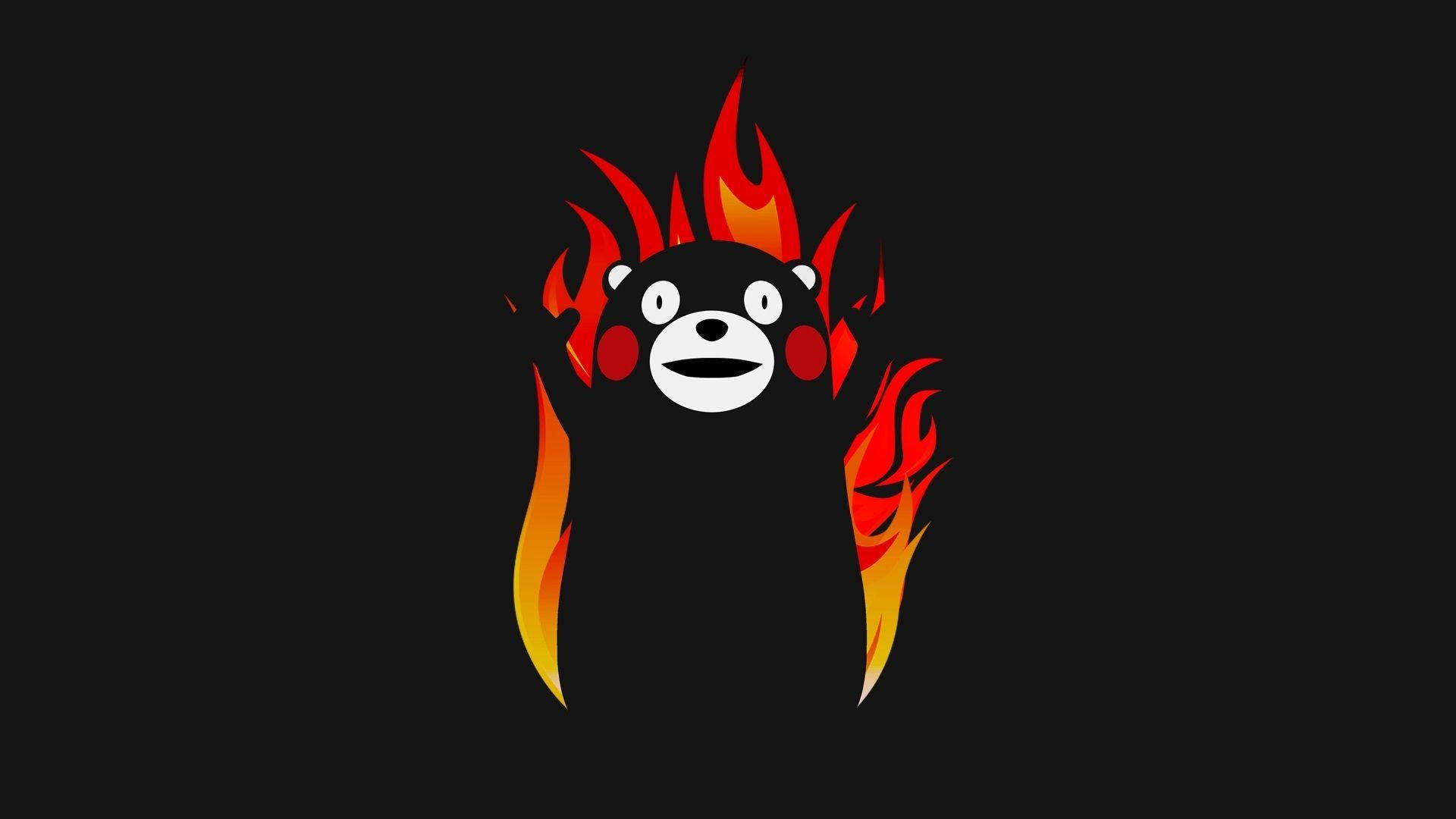 Kumamon 桌布 壁紙 — 一隻風格化的黑熊，頭部和側面噴出火紅和橙色的火焰，背景為純黑色。