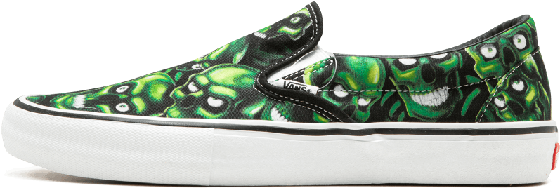 Vans 桌布 壁紙 — 一雙Vans slip-on運動鞋，黑色布料上有鮮綠色骷髏圖案，白色橡膠鞋底。