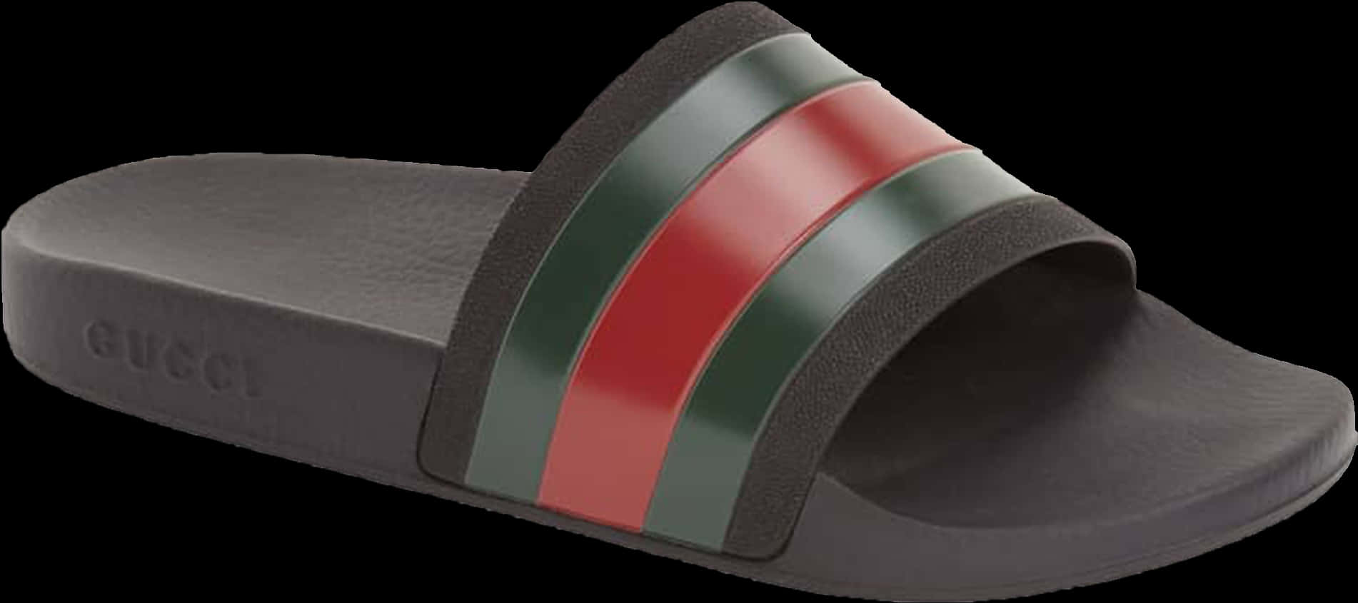 Gucci 桌布 壁紙 — 一雙時尚的黑色Gucci拖鞋，帶有鮮明的紅綠條紋，襯托在純黑背景上。