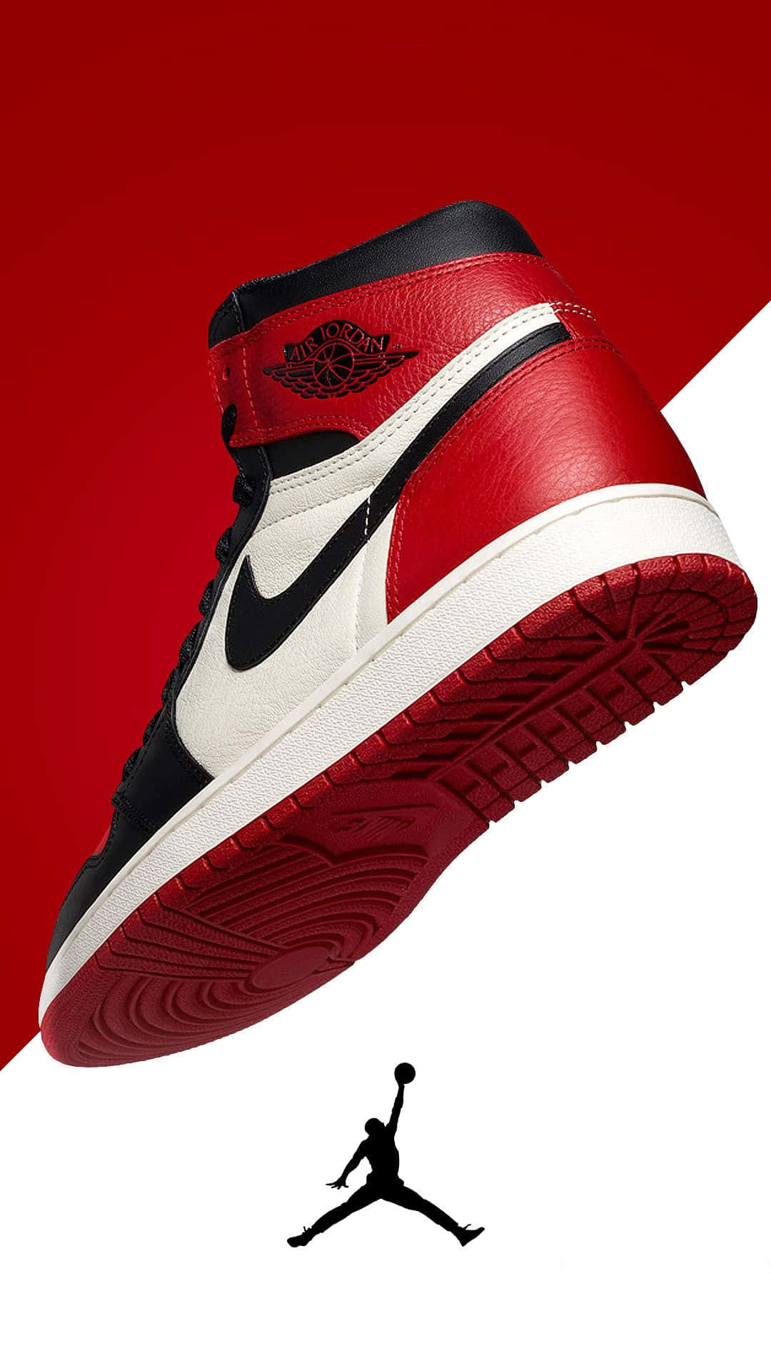 Sneakers 桌布 壁紙 — 一雙紅、黑、白色的 Air Jordan 1 運動鞋以對角線漂浮在搶眼的紅白分割背景上，下方有 Jumpman 標誌。