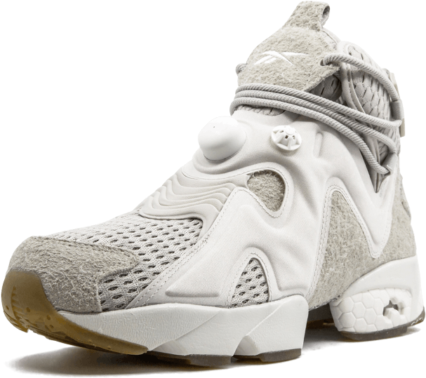 Reebok 桌布 壁紙 — 一雙純白色高筒運動鞋，帶有紋理網眼面板和獨特的圓形後跟，在純黑色背景下格外突出。