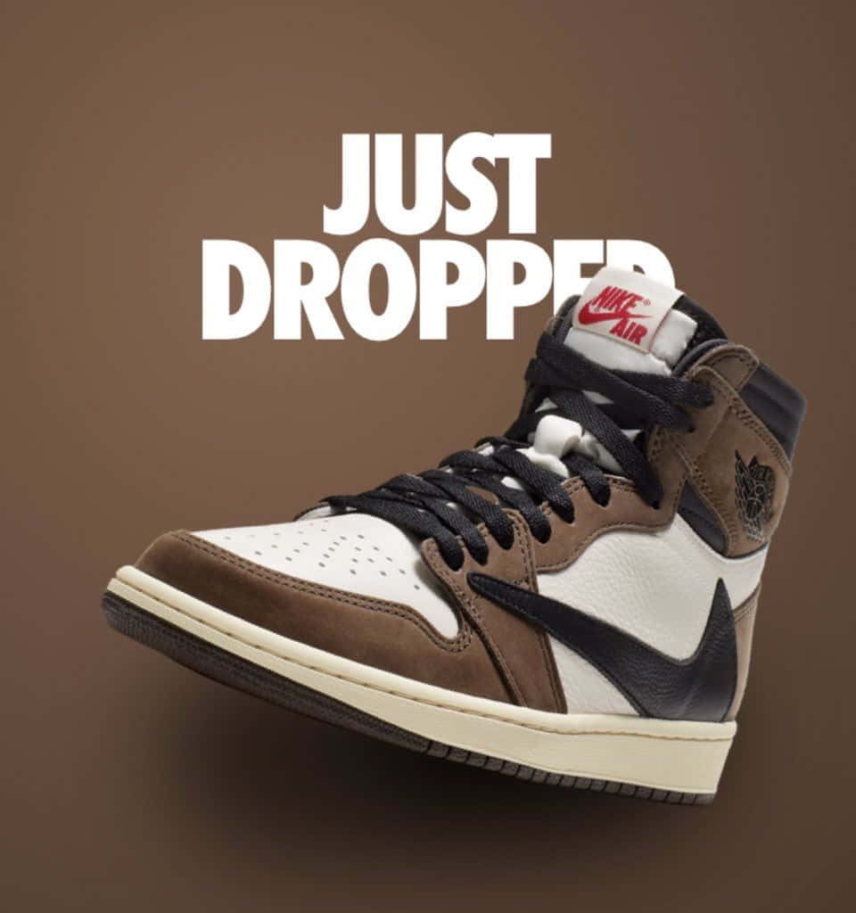 Nike Air Jordan運動鞋，棕色背景上寫有「just dropped」文字 — Michael B Jordan 壁紙