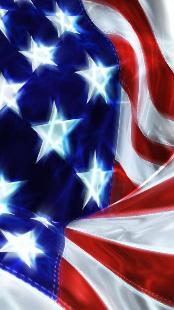 American Flag iPhone 桌布 壁紙 — 一面充滿動感的美國國旗，帶有發光的星星和流動的條紋，色彩鮮豔的紅、白、藍。