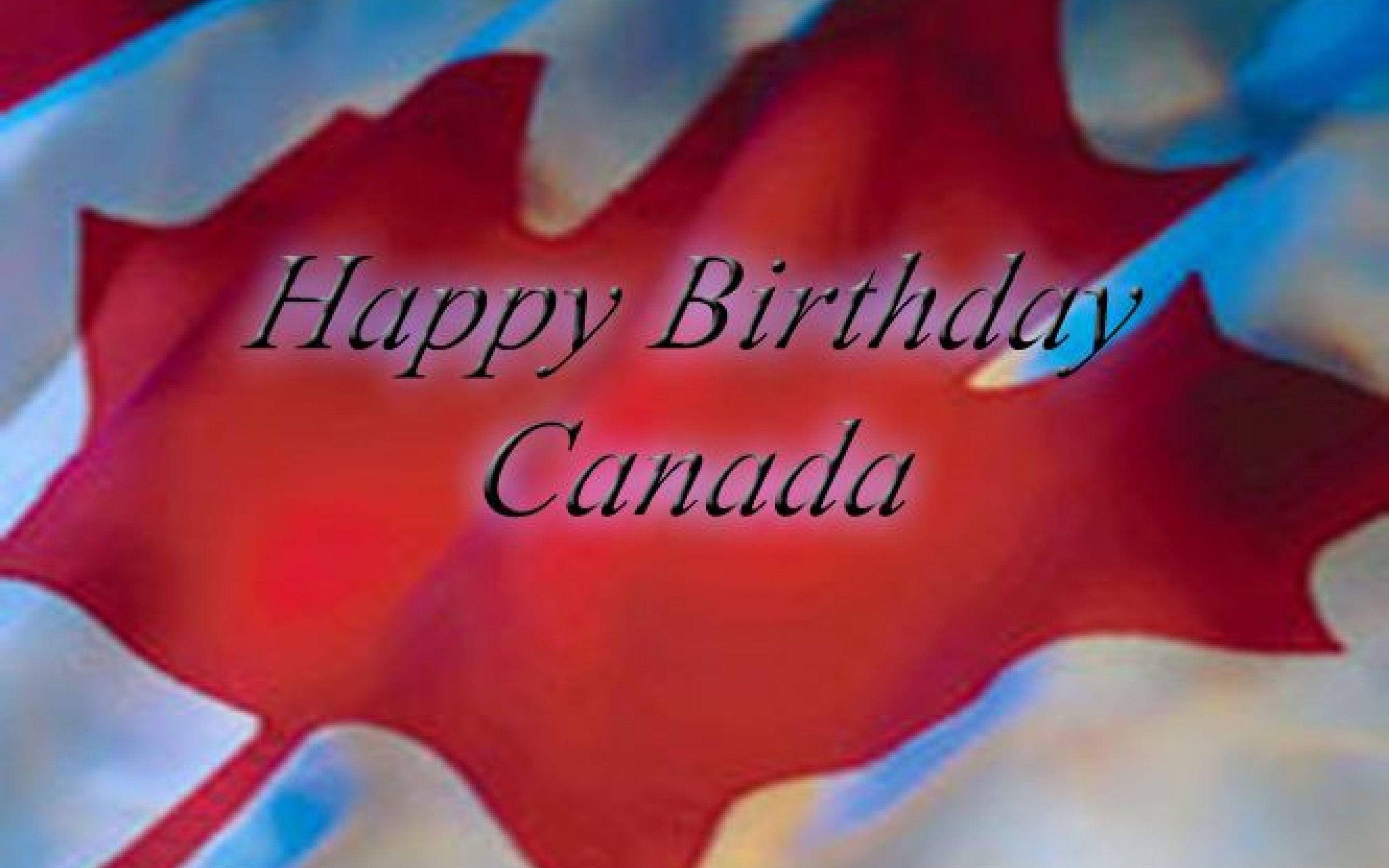 Canada Day 桌布 壁紙 — 一面充滿活力的加拿大國旗，帶有飄逸的紅色和白色布料，作為優雅的黑色草書文字「Happy Birthday Canada」的背景。