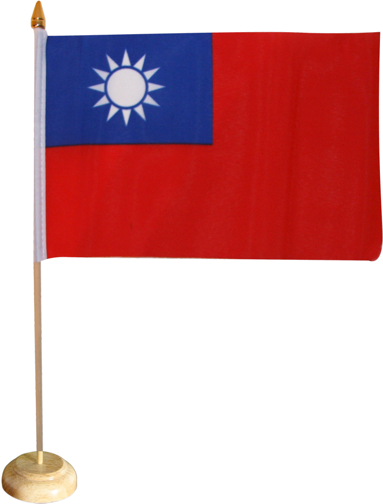 Flag 桌布 壁紙 — 一面台灣小桌旗，藍色長方形與紅色旗地上的白色太陽，安裝在木桿上，背景為黑色。