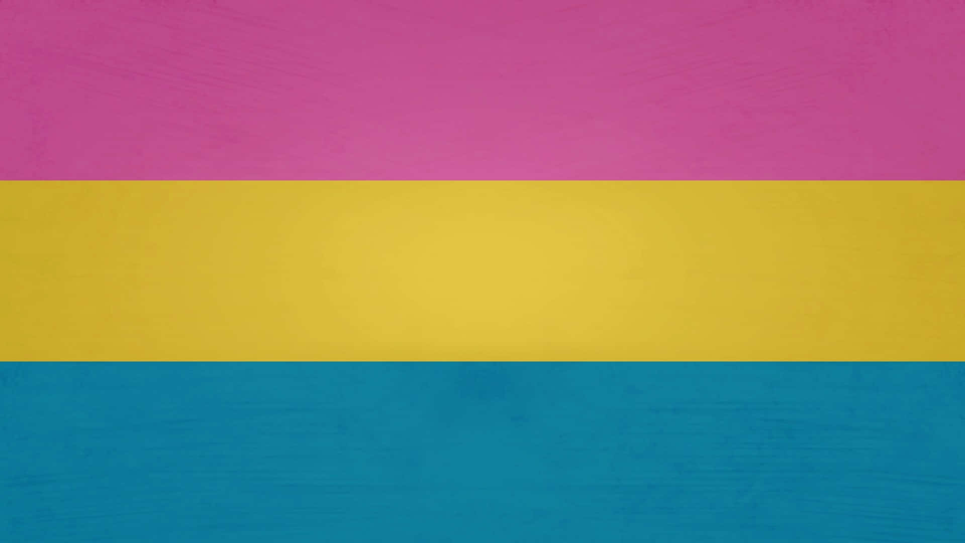 Pansexual 桌布 壁紙 — 一面有紋理的旗幟，上面有粉紅色、黃色和藍色的三條水平條紋，繪製在粗糙的表面上。