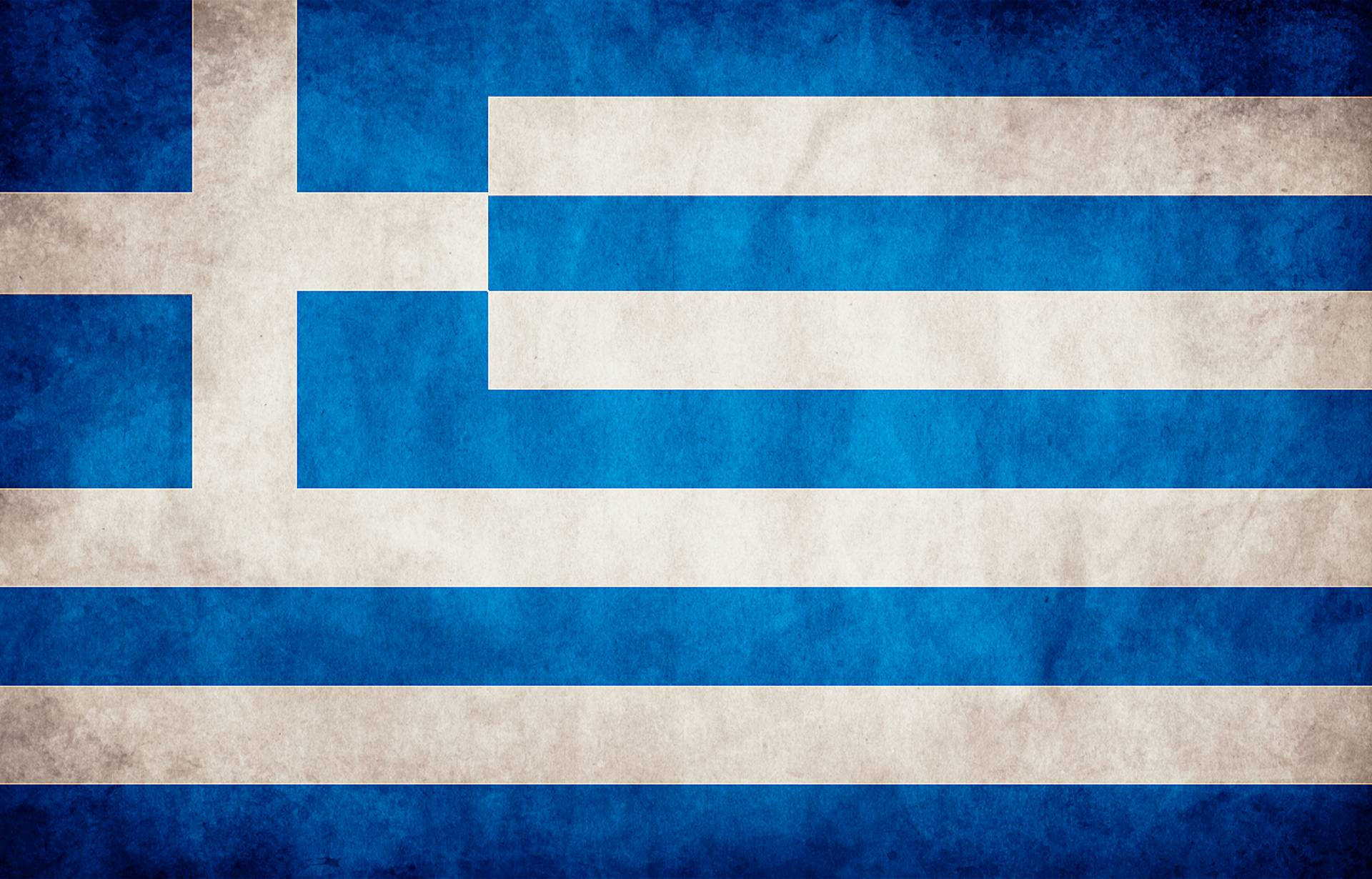 greek 桌布 壁紙 — 一面經過風化的希臘國旗，帶有藍白條紋和十字，顯示出質感和歲月痕跡。
