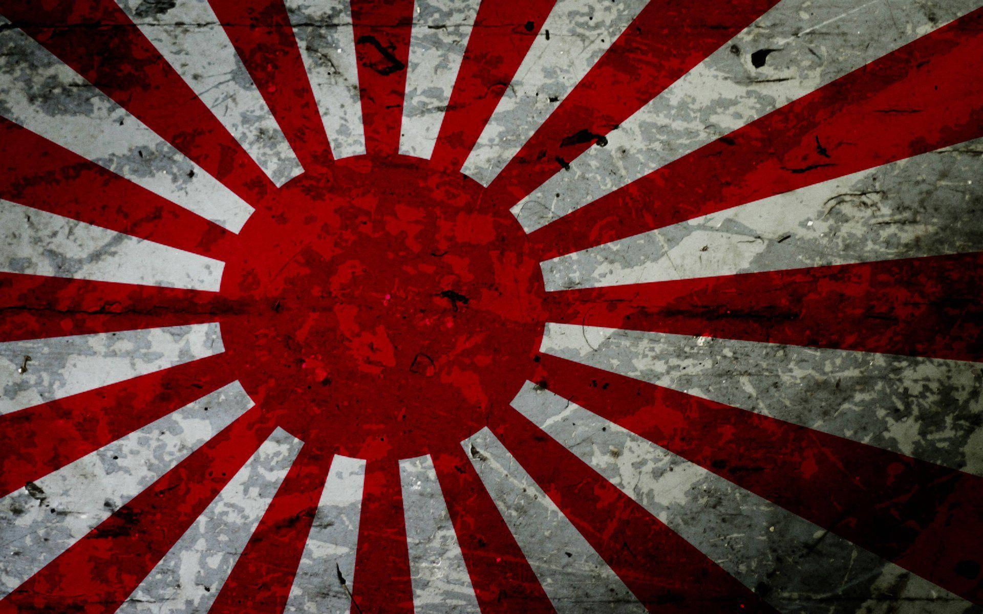 風化的日本旭日旗，紅色光線和灰色紋理。