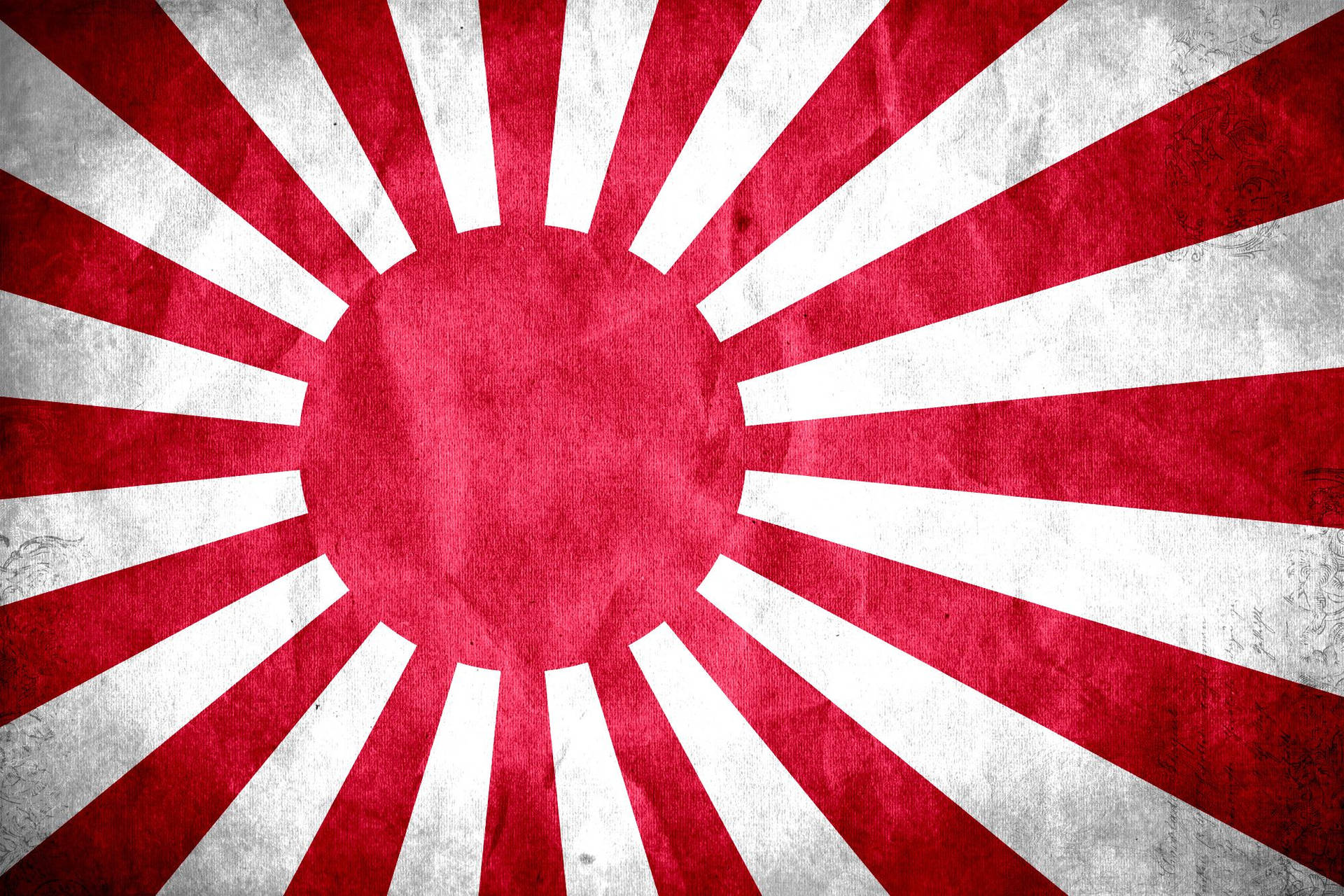 經風化的日本旭日旗，帶有紅白光芒。