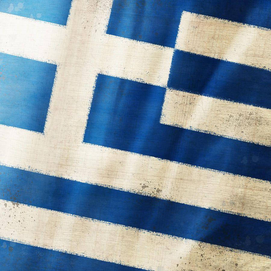 greek 桌布 壁紙 — 一面經風吹日曬的希臘國旗，帶有藍白條紋和十字架，顯現出風和時間造成的質感和歲月痕跡。