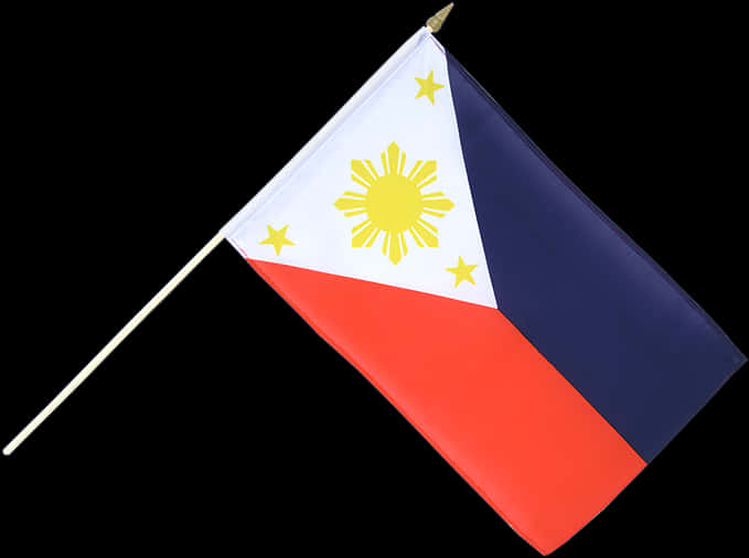 Flag Of The Philippines 桌布 壁紙 — 一面菲律賓國旗插在棍子上，傾斜地靠在純黑色背景前，呈現鮮明的紅、藍、白色。