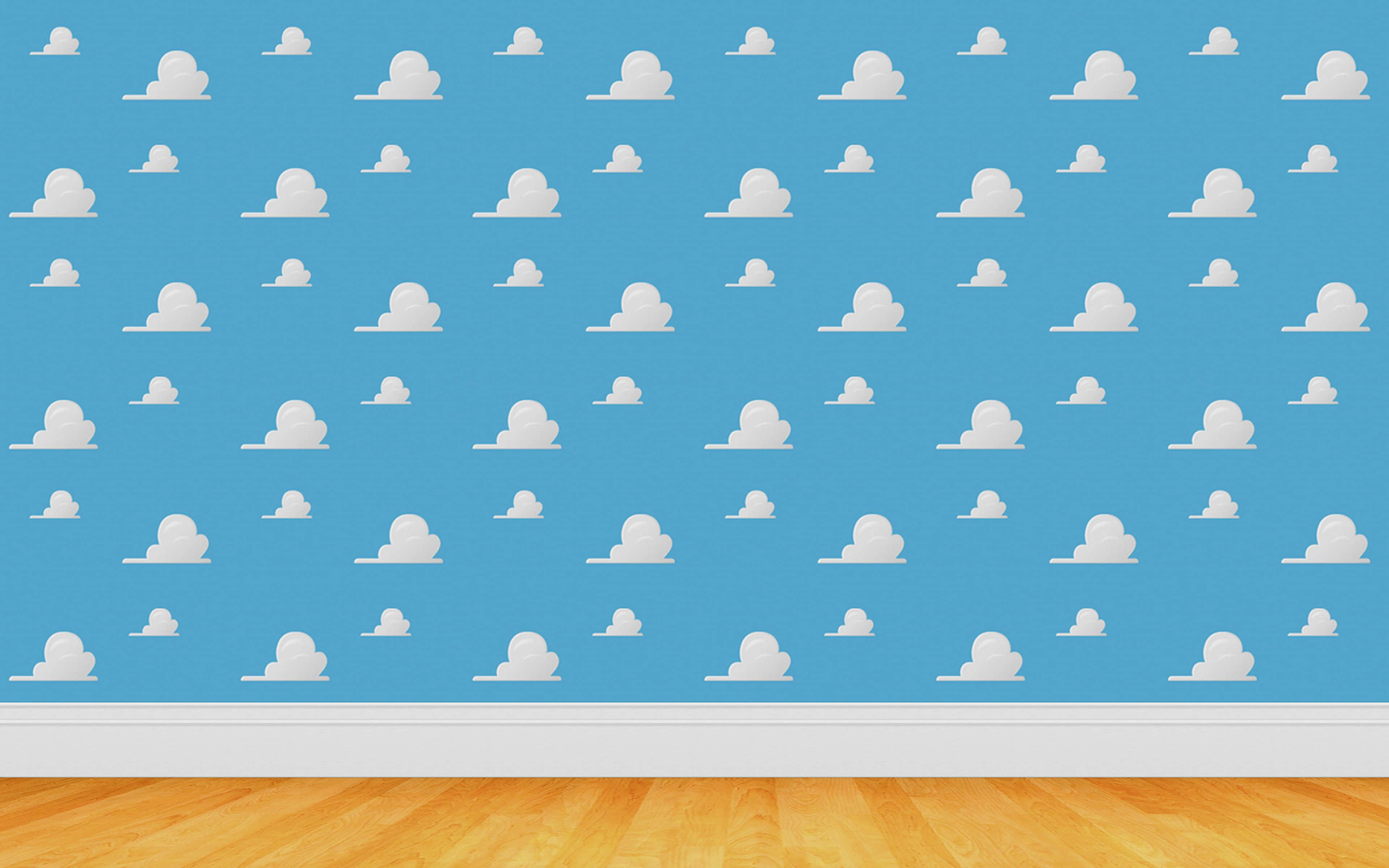 Toy Story Cloud 桌布 壁紙 — 一面藍色牆壁覆蓋著白色雲朵貼紙，與淺色木地板和白色踢腳線相遇。