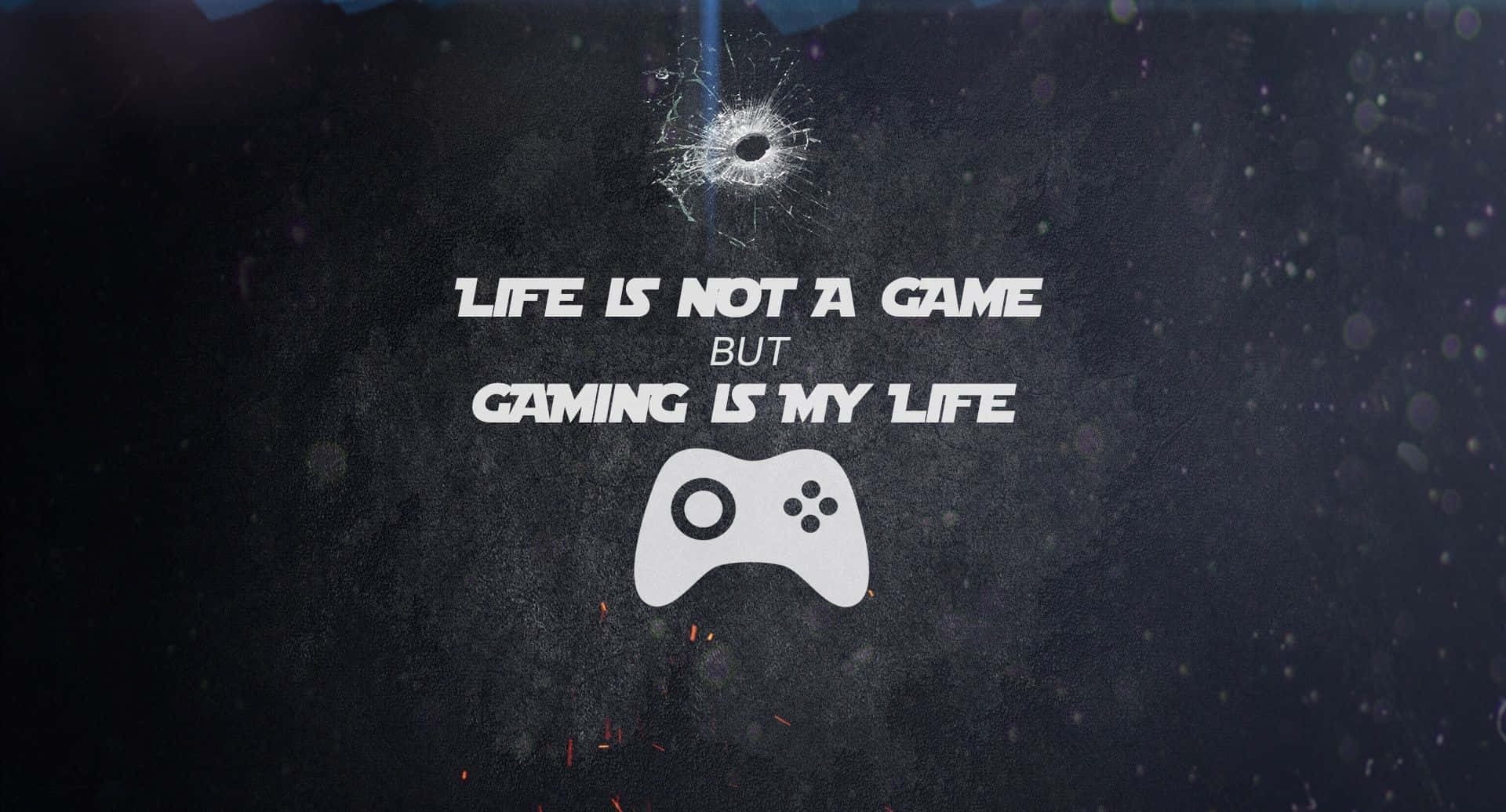 Pro Gamer 桌布 壁紙 — 一面裂開的深色牆壁，上面有白色文字寫著「LIFE IS NOT A GAME BUT GAMING IS MY LIFE」，下方有一個遊戲控制器。