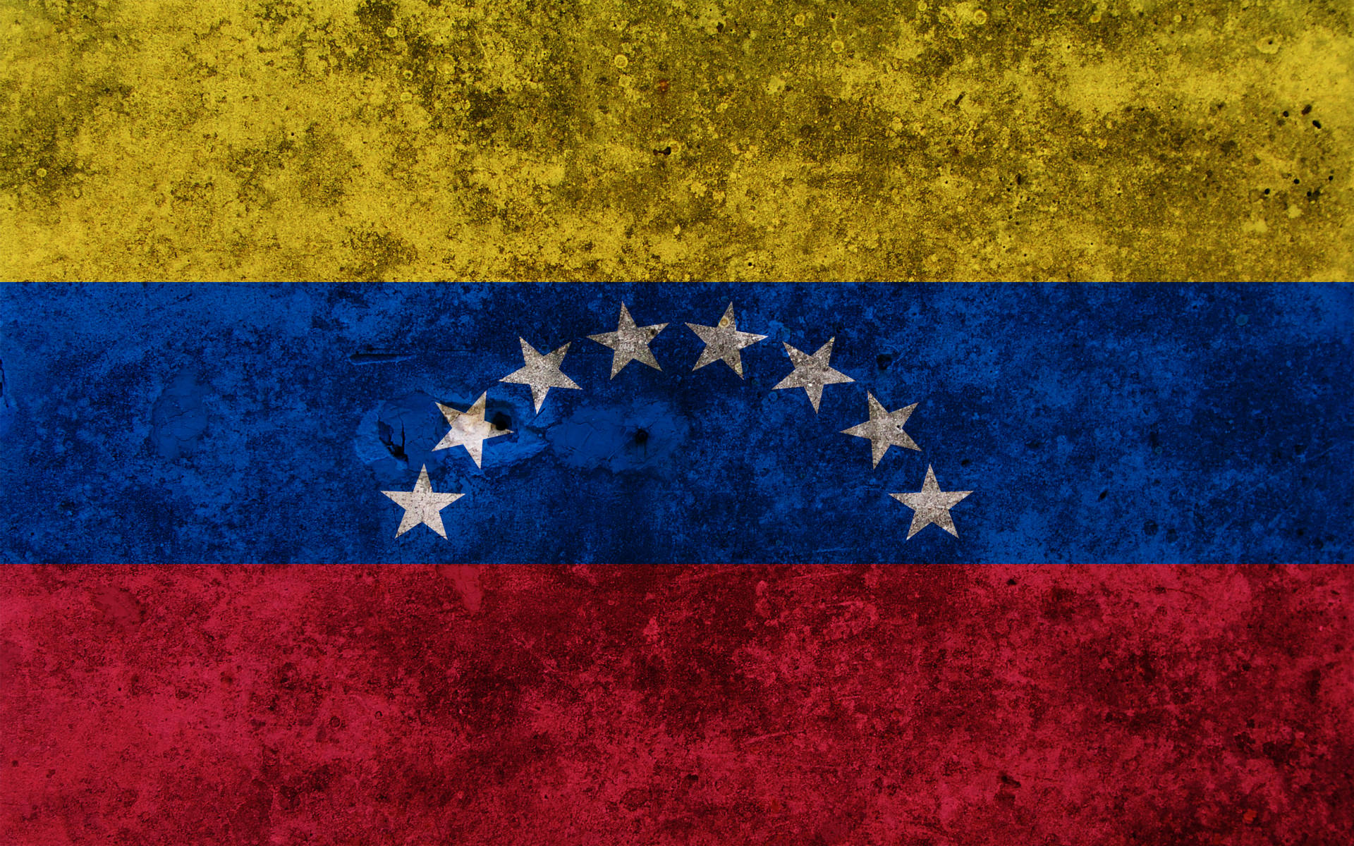 Venezuela 桌布 壁紙 — 一面褪色的委內瑞拉國旗，帶有黃、藍、紅條紋和八顆白色星星排成半圓形。