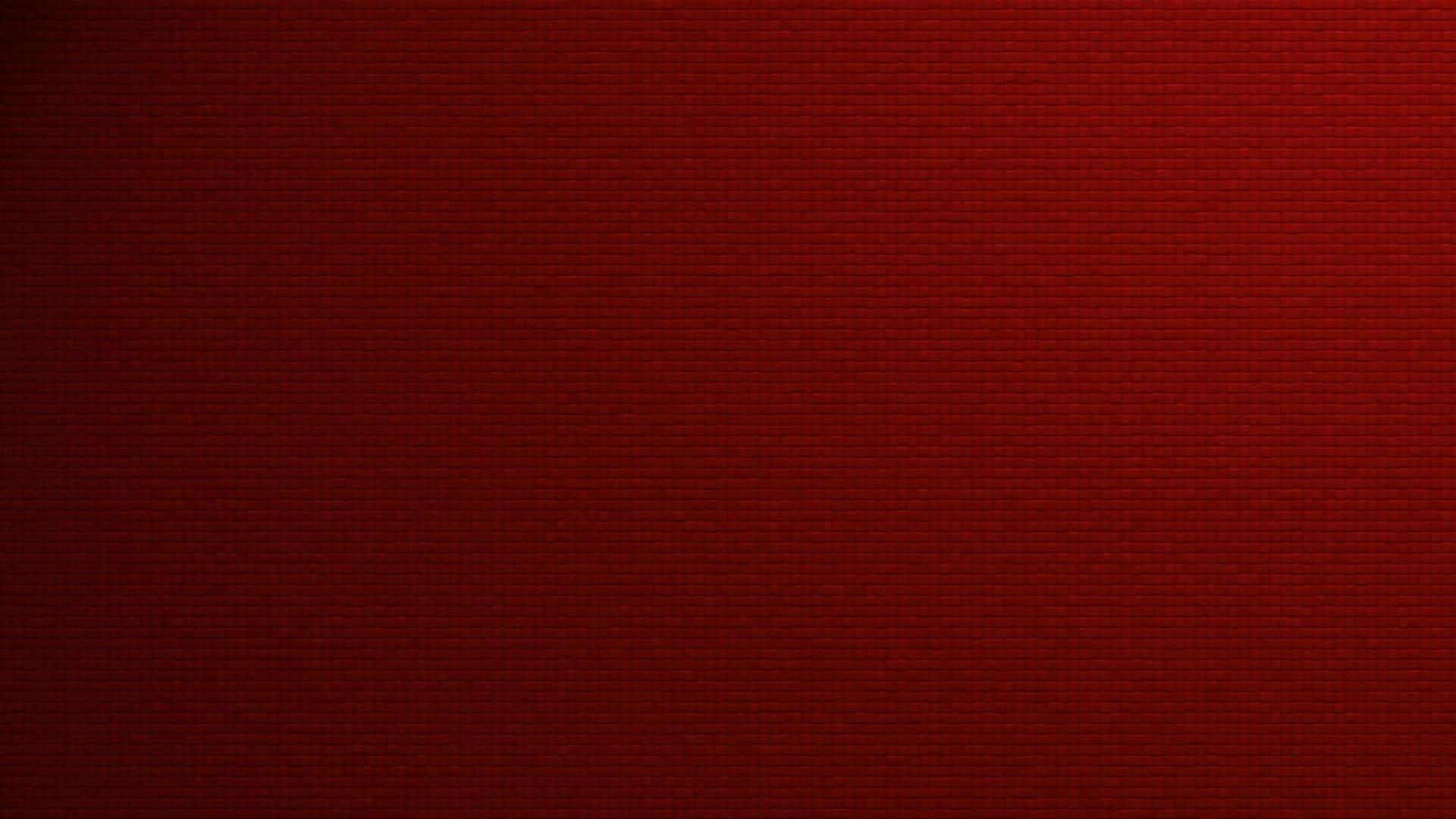 Dark Red Aesthetic 桌布 壁紙 — 一面豐富深紅色的紋理牆，帶有微妙的漸變燈光和模糊的磚紋圖案。