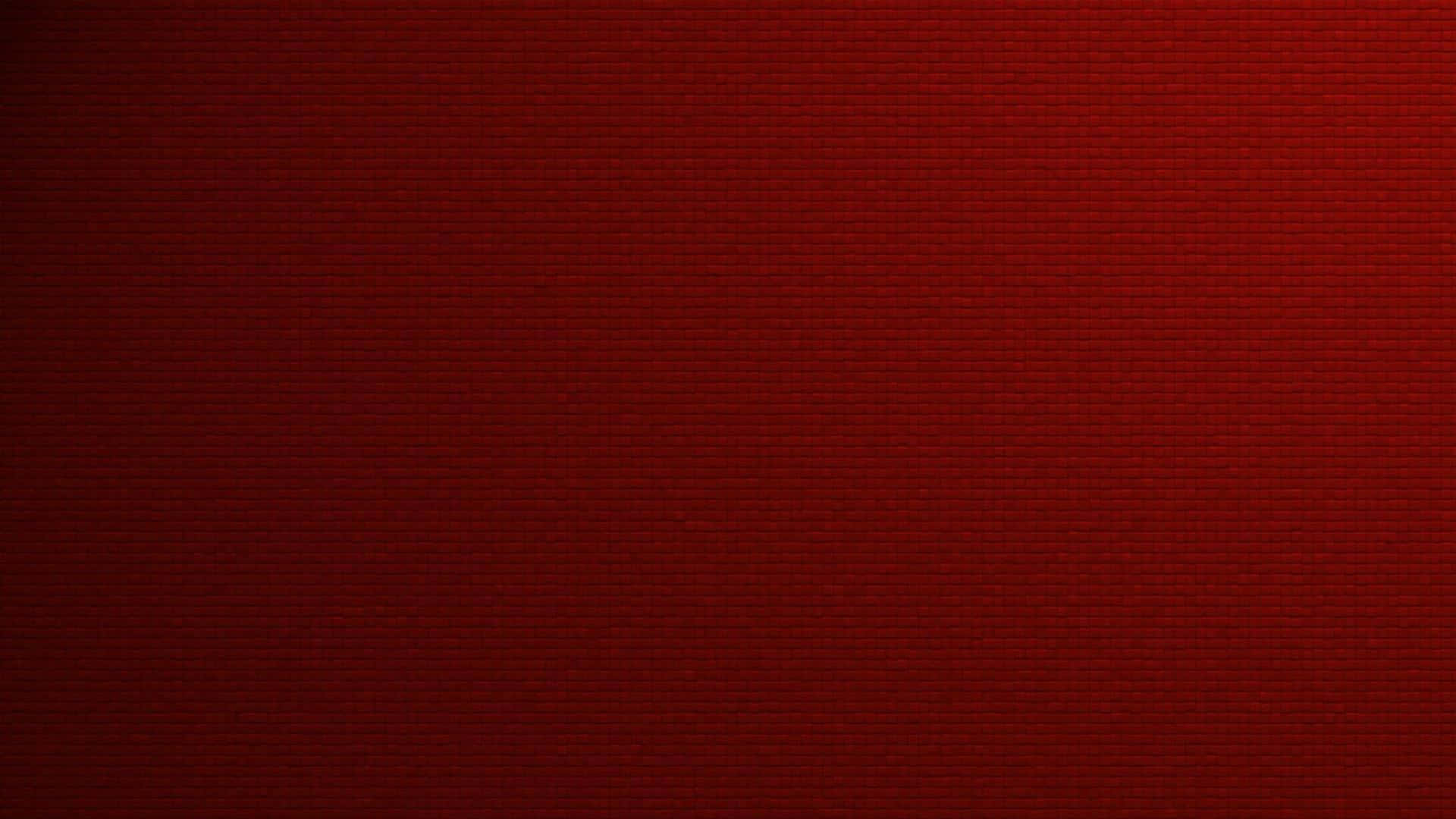 1920x1080 Red 桌布 壁紙 — 一面質感細膩、帶漸變燈光的深紅色磚牆。