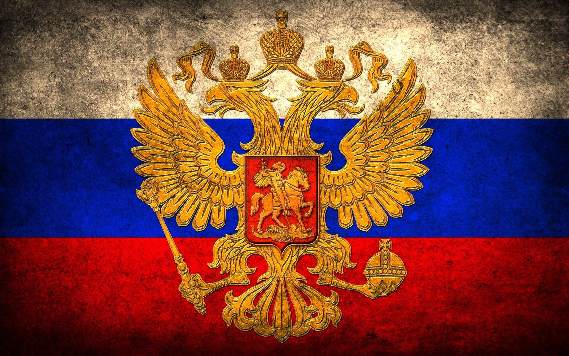 Russia 桌布 壁紙 — 一面風化的俄羅斯國旗，中央有金色雙頭鷹徽章，位於藍色和紅色條紋之上。