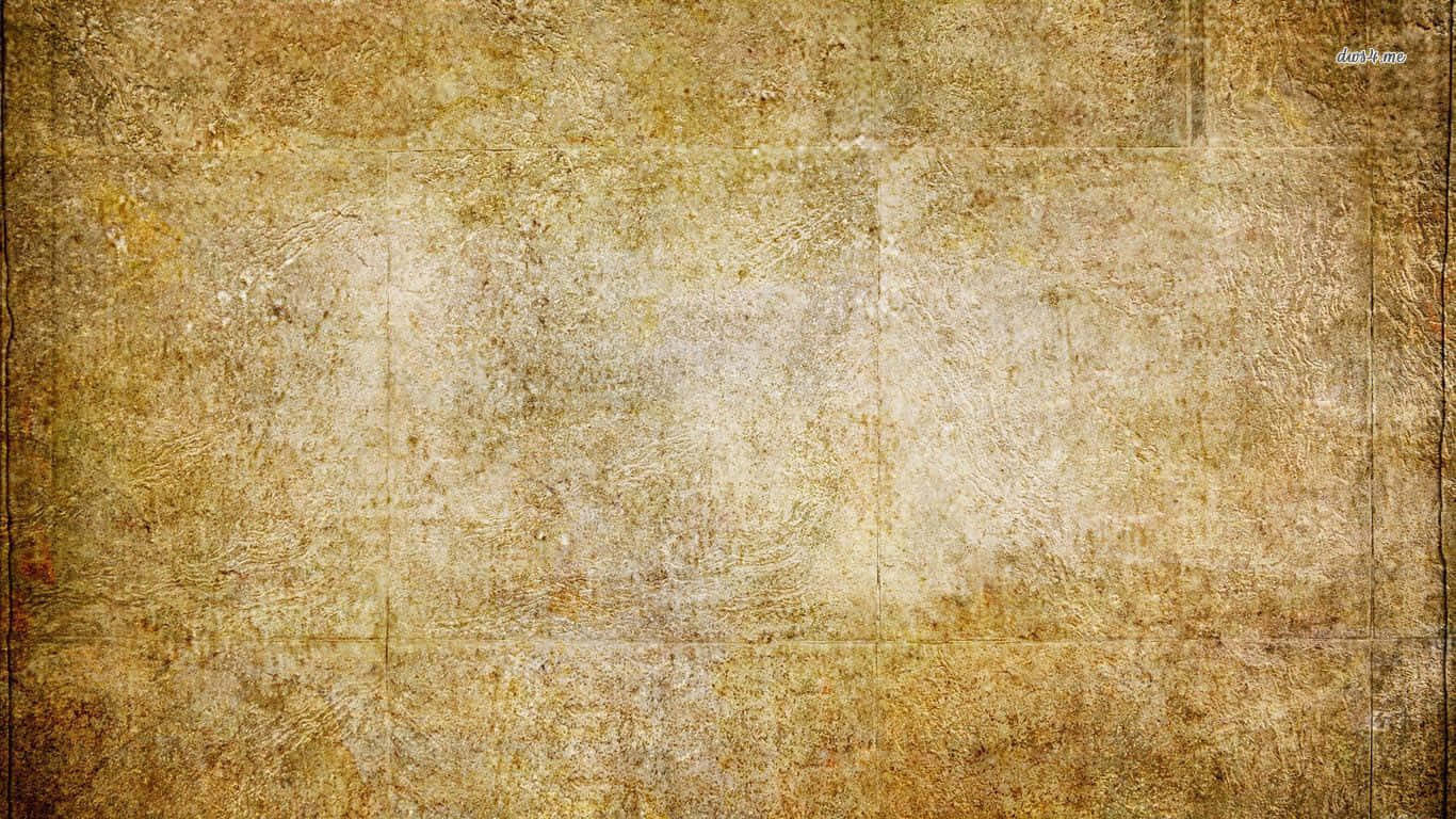 Yellow Grunge 桌布 壁紙 — 一面風化的復古牆，帶有裂開的灰泥和褪色的赭色色調，展現歲月和質感。