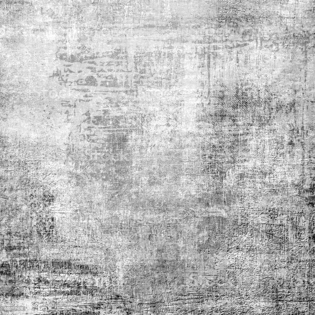 Grey Texture 桌布 壁紙 — 一面風化的混凝土牆，帶有層層污垢和褪色的塗鴉，呈現單色調。