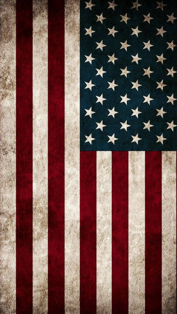American Flag iPhone 桌布 壁紙 — 一面風化的美國國旗，褪色的紅白條紋和星星區域顯示出老化和磨損的跡象。
